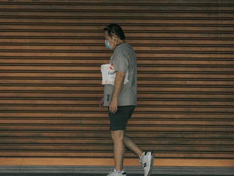 A man walking along a street